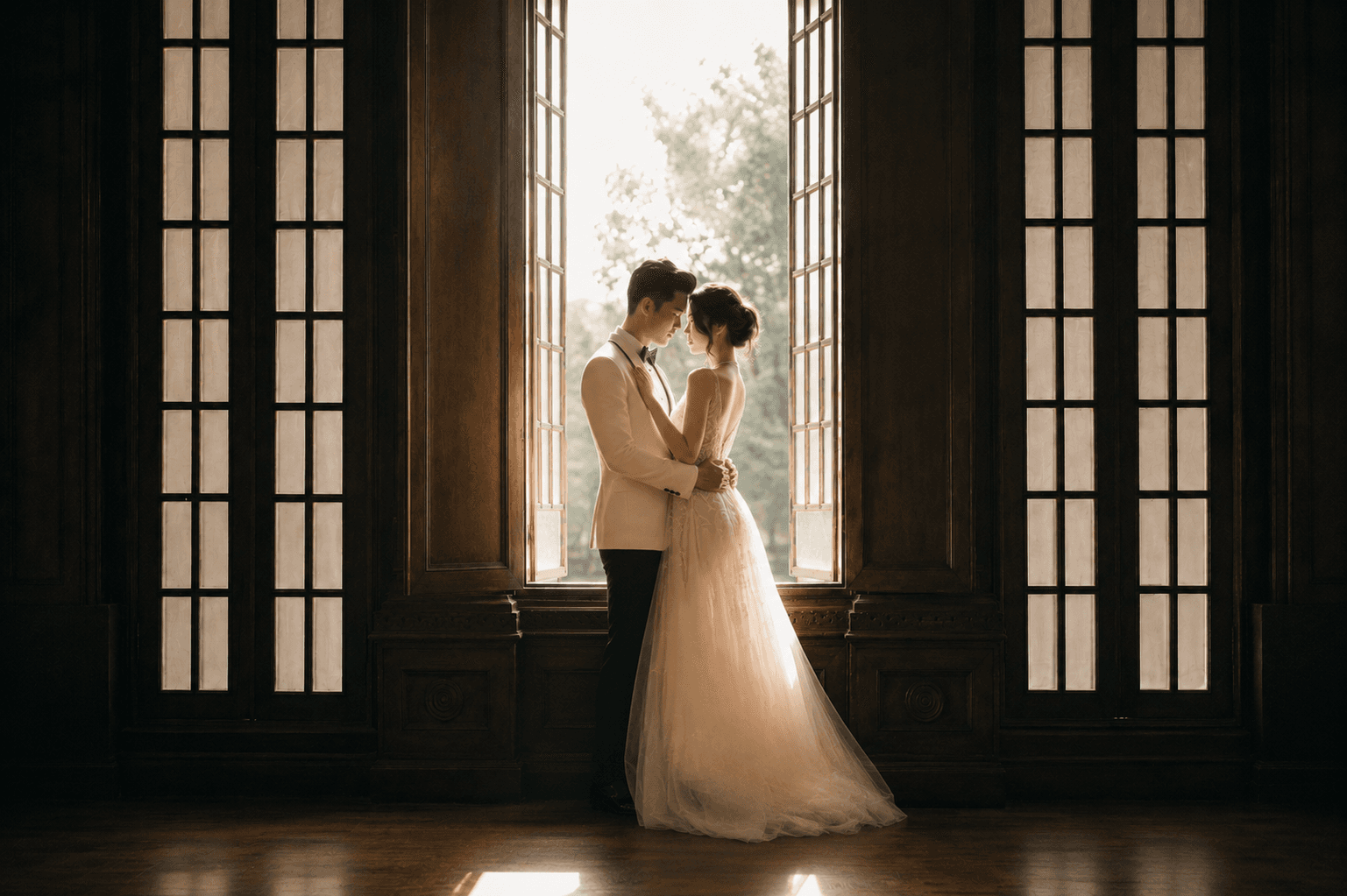 Ricky and Fellycia by an open window